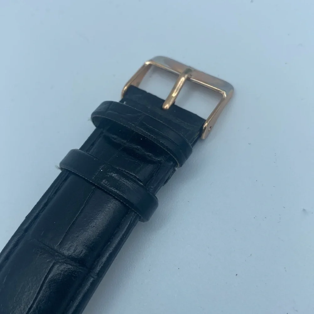US Polo Assn rose gold tone wristwatch faux leather black band needs battery